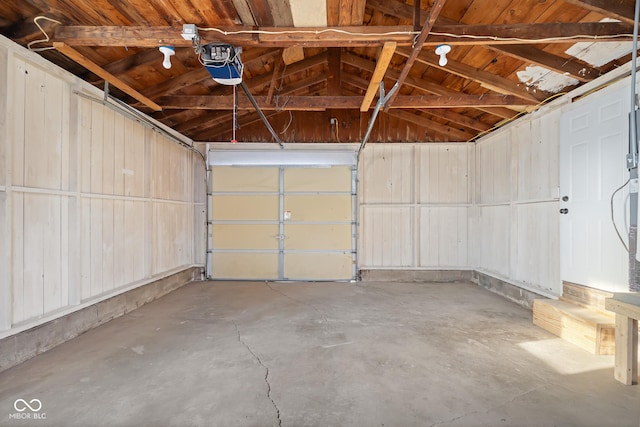 garage featuring a garage door opener