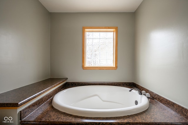 full bathroom with a garden tub