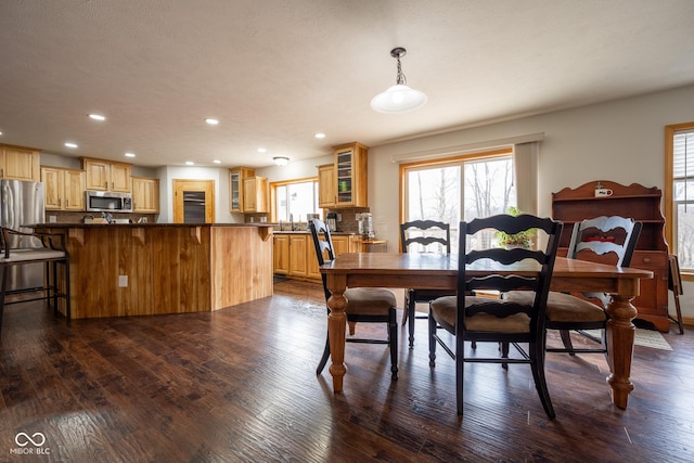 dining room featuring recessed lighting and dark wood-style flooring