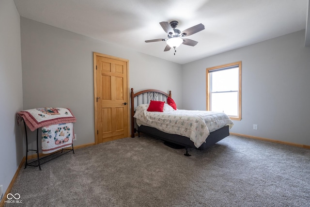 bedroom with baseboards, carpet, and a ceiling fan