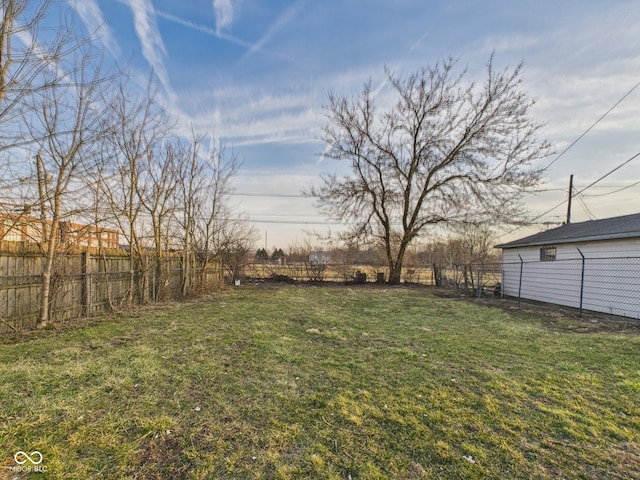 view of yard with a fenced backyard