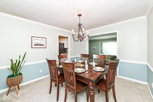 dining area featuring a notable chandelier, light colored carpet, baseboards, and a textured ceiling