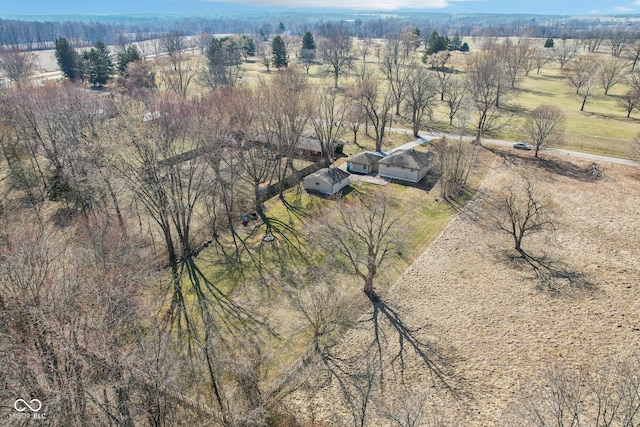 birds eye view of property with a rural view