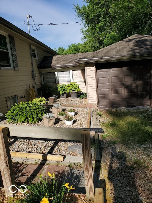 view of yard featuring a garage