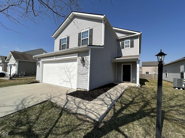 traditional-style house with concrete driveway, cooling unit, a garage, and a front yard