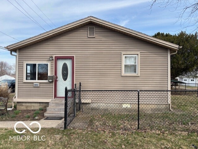 view of front of house with fence