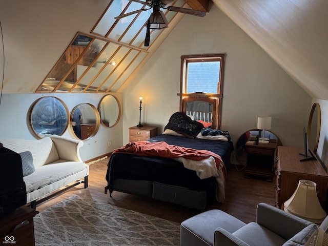 bedroom featuring lofted ceiling with beams and wood finished floors