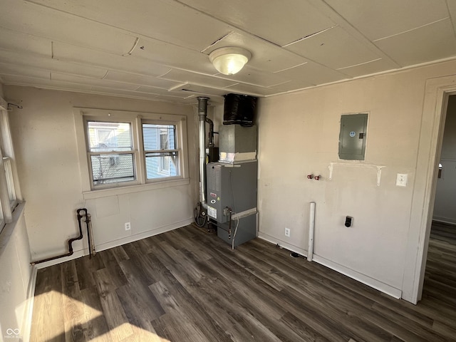 interior space with electric panel and dark wood-type flooring