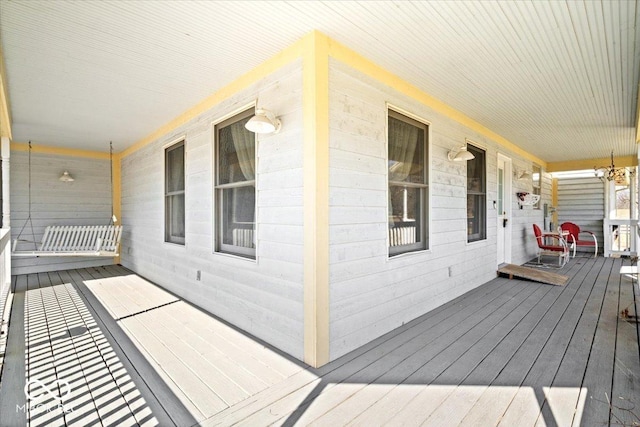 wooden deck featuring covered porch