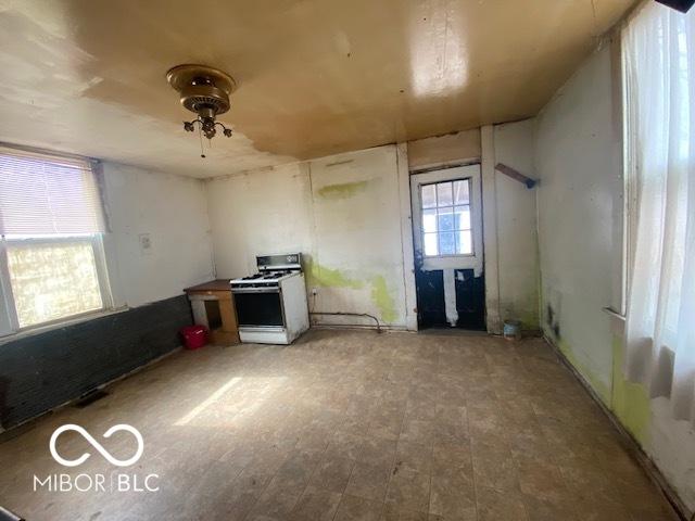 kitchen featuring white gas range