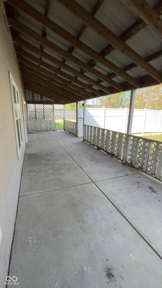 view of patio / terrace featuring fence