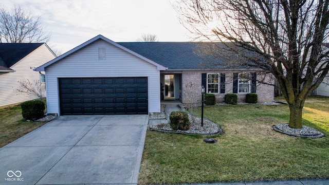 ranch-style home featuring a front yard, roof with shingles, concrete driveway, a garage, and brick siding