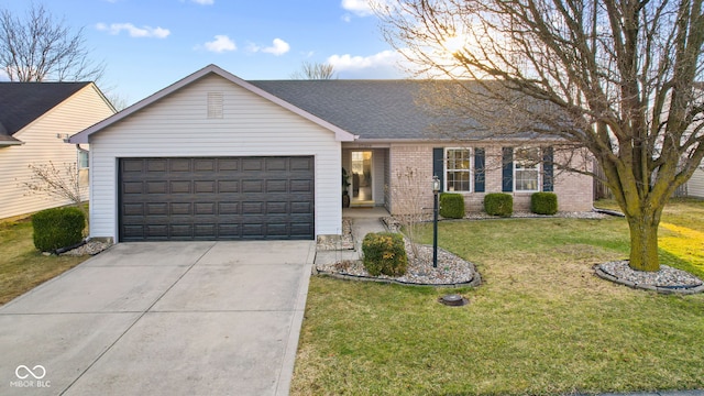 view of front facade featuring brick siding, a front lawn, roof with shingles, a garage, and driveway