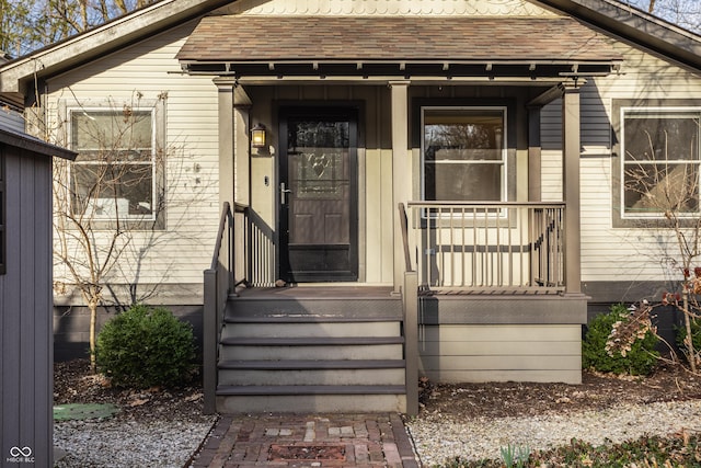 doorway to property with covered porch