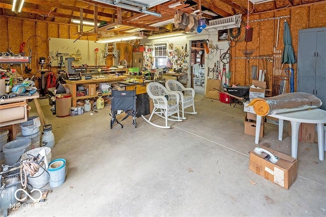 garage with a workshop area