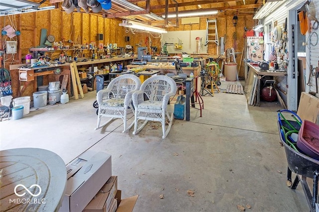 garage featuring a workshop area