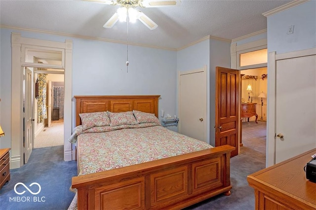 bedroom with dark colored carpet, a textured ceiling, ceiling fan, and crown molding