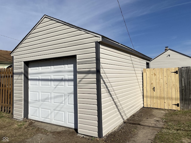 detached garage with fence