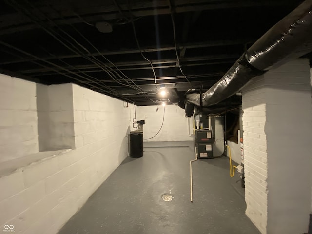 unfinished basement with heating unit