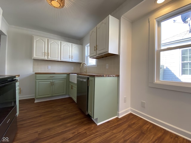 kitchen featuring dishwasher, dark wood-type flooring, white cabinets, and baseboards