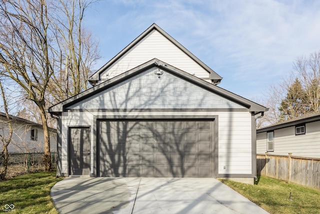 garage with fence