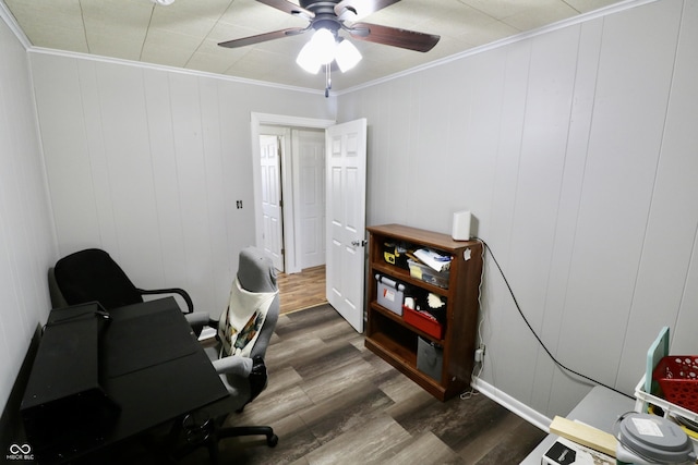 office featuring ceiling fan, wood finished floors, and crown molding