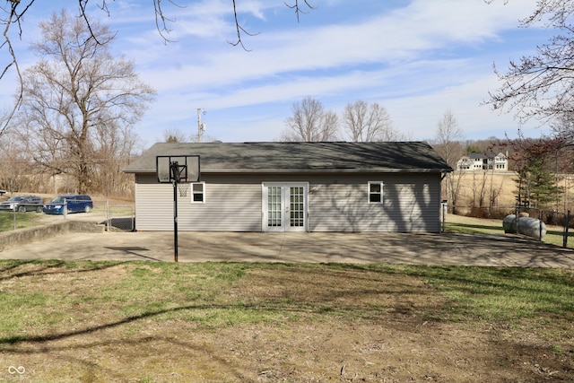 back of property featuring a patio, a yard, french doors, and fence