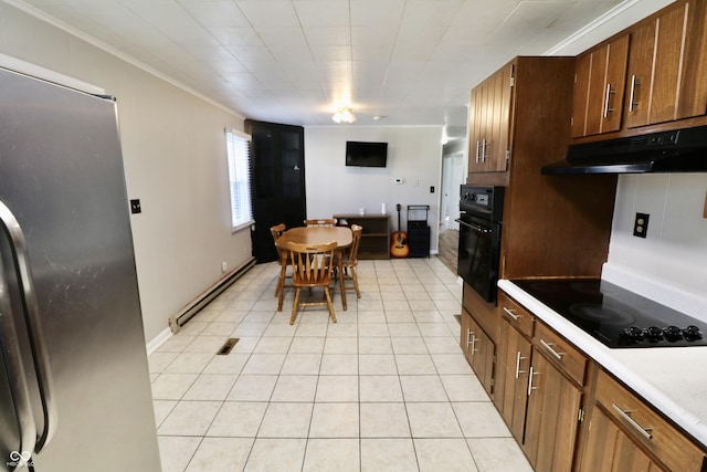 kitchen with black appliances, under cabinet range hood, light countertops, light tile patterned floors, and baseboard heating