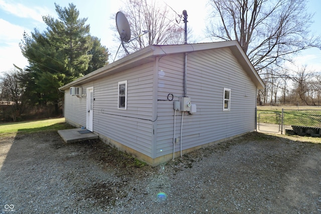 view of home's exterior featuring a gate