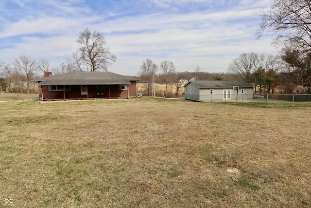 view of yard with fence