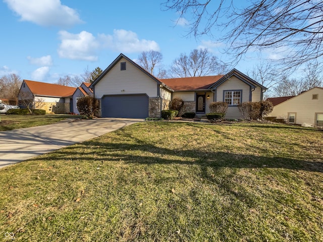 single story home with a garage, a front lawn, and driveway