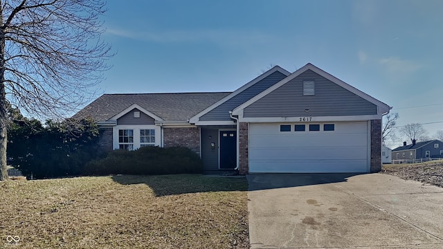 ranch-style house with brick siding, a front lawn, concrete driveway, roof with shingles, and an attached garage