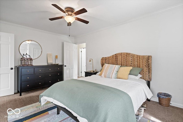 carpeted bedroom with ceiling fan, baseboards, and ornamental molding