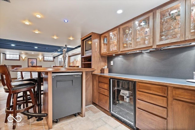 bar with visible vents, wine cooler, a dry bar, recessed lighting, and refrigerator