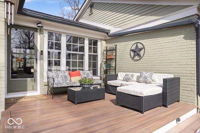 wooden deck with an outdoor hangout area