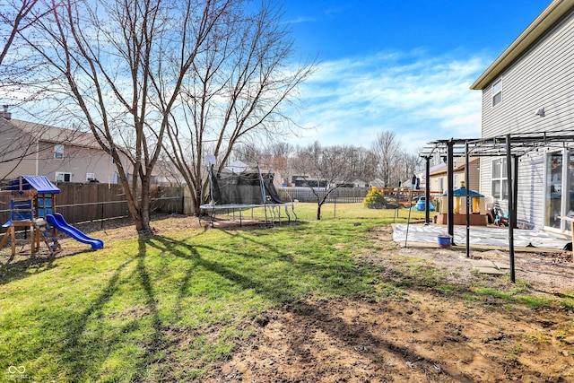 view of yard featuring a playground, a trampoline, a fenced backyard, and a pergola