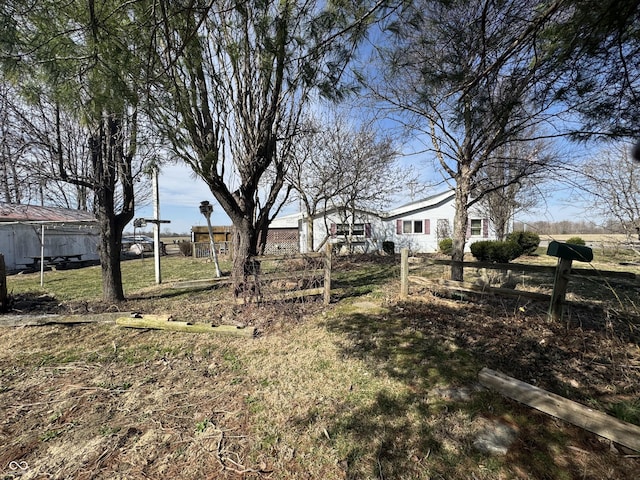 view of yard with fence