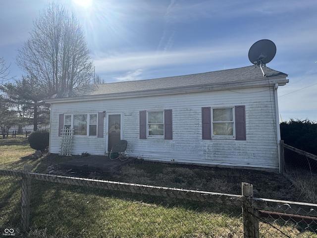 view of front of home featuring a fenced backyard