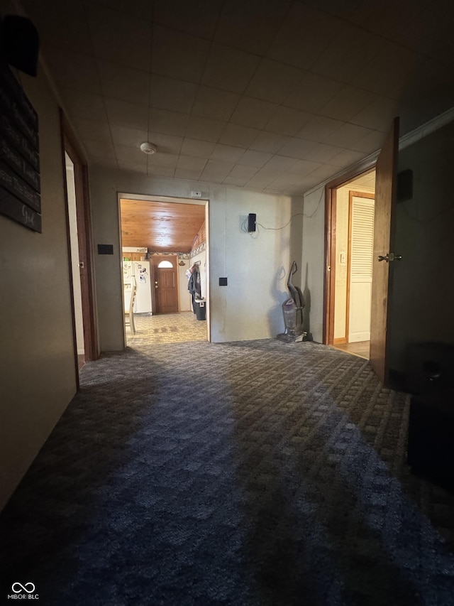 hallway featuring carpet flooring