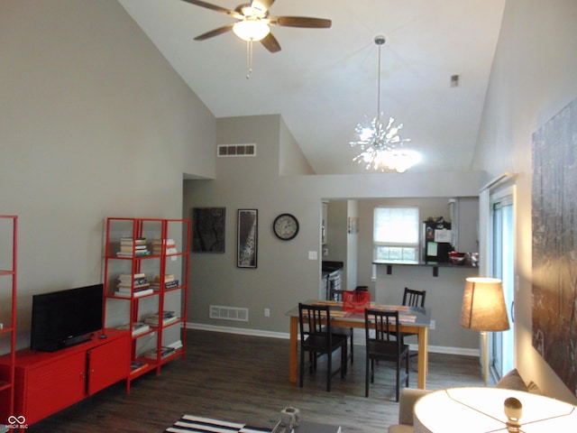 dining room with visible vents, baseboards, and wood finished floors