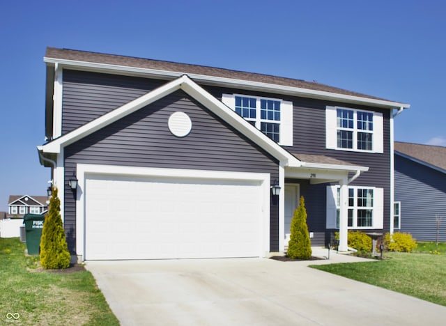 298 Rocky Rd, Greenfield, IN 46140 - traditional-style house with driveway, a front yard, and a garage