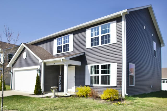 298 Rocky Rd, Greenfield, IN 46140 - traditional-style home featuring a front lawn, driveway, and a garage