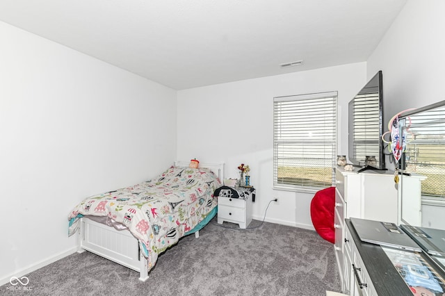 bedroom featuring carpet, visible vents, and baseboards