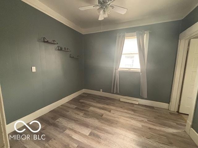 1713 Charles St, Lafayette, IN 47904 - empty room featuring a ceiling fan, wood finished floors, and baseboards
