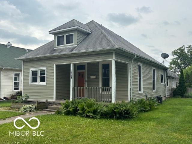 1713 Charles St, Lafayette, IN 47904 - view of front facade featuring a porch and a front lawn