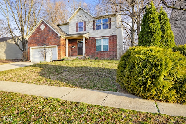 traditional-style house with a front yard, brick siding, a garage, and driveway