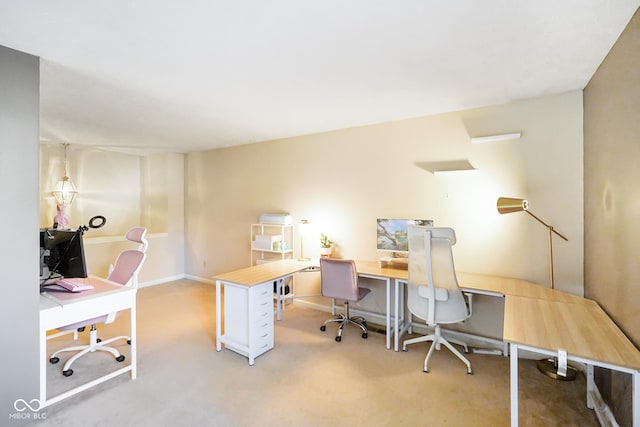 office featuring light colored carpet and baseboards