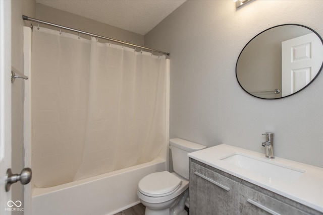 bathroom featuring toilet, a textured ceiling, vanity, and shower / bathtub combination with curtain