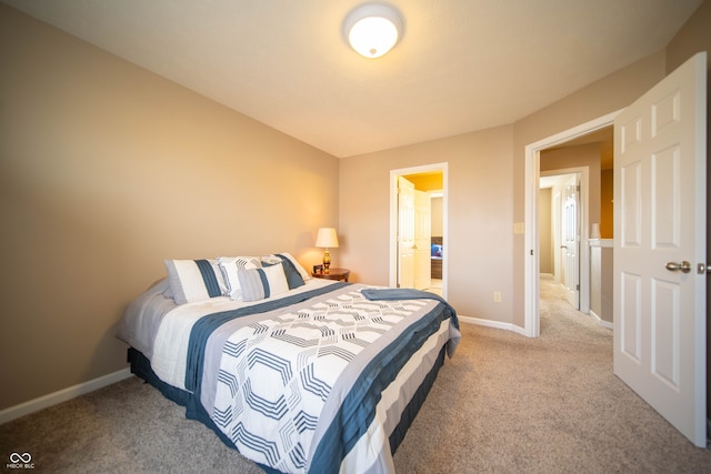 bedroom featuring baseboards and carpet flooring