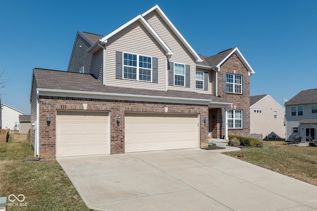 view of front facade with a front lawn, brick siding, and driveway